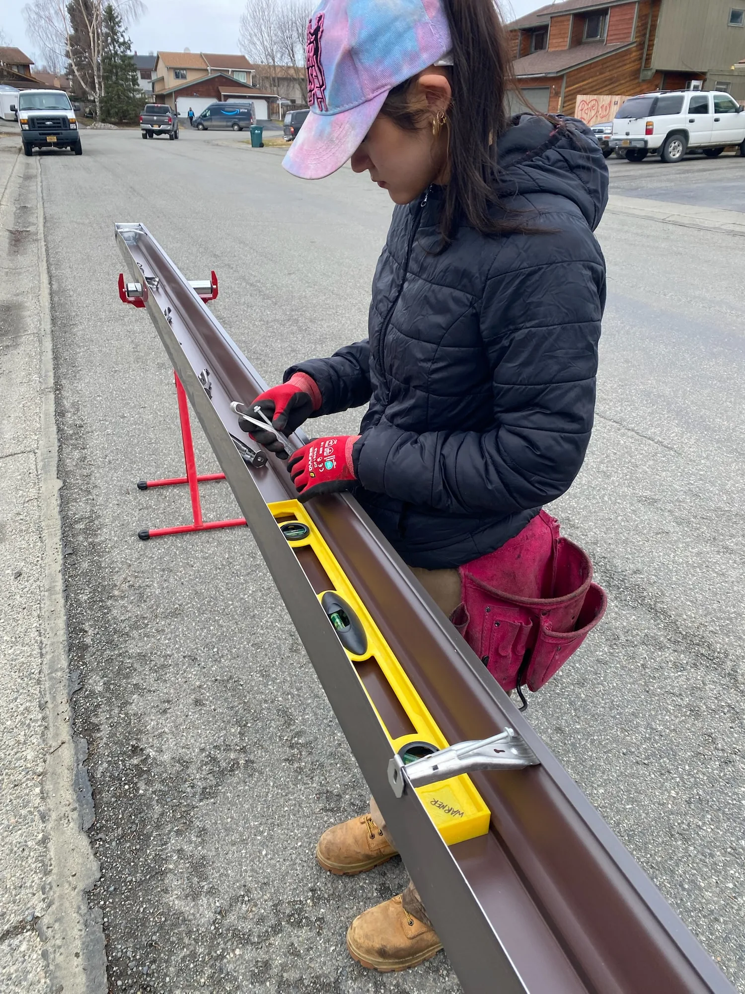 Measuring a new seamless gutter run on-site